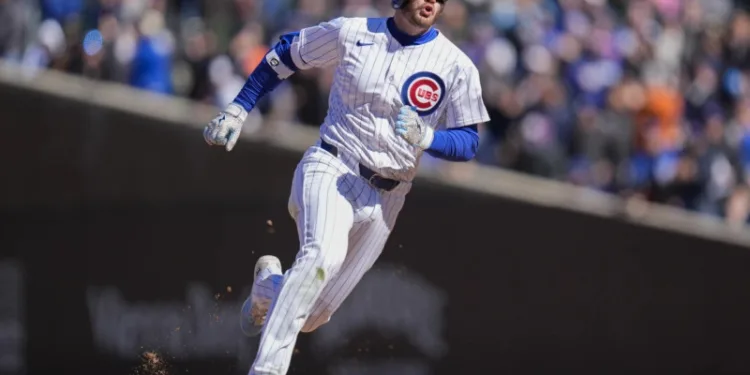 Teoscar da tres hits y empuja 4, pero los Dodgers caen ante los Cubs